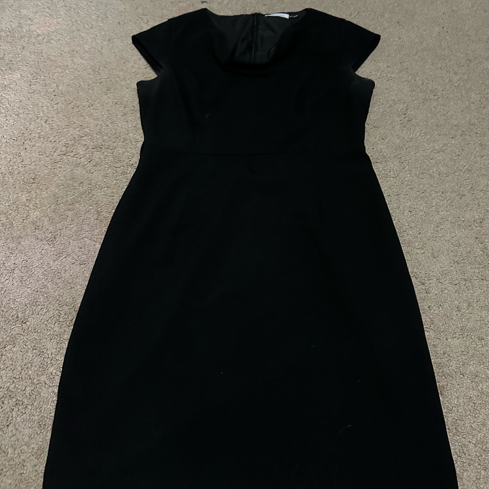 All black dress by Calvin Klein.